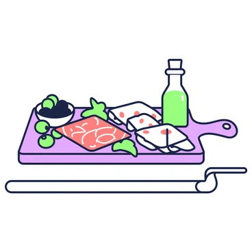 A cutting board is set on a wooden countertop, displaying an assortment of antipasto items. There are green and black olives arranged in a small bowl placed on one side of the board. Next to the olives, slices of cured meats such as salami and prosciutto are neatly laid out, showcasing their texture and marbling. A couple of slices of cheese are also present, sliced into triangular pieces. A sprig of fresh basil adds a touch of green next to the food items. The scene is completed with a small dish of olive oil standing beside the board, creating an inviting spread for tasting.