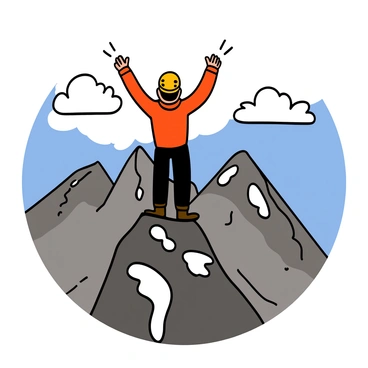 A mountain climber with light skin and short black hair stands triumphantly at the peak of a high mountain. The climber is wearing a bright orange jacket, black climbing pants, and a helmet. Arms raised in celebration, he gazes out at a panoramic vista of rugged peaks in the distance. The sky is clear with a few fluffy white clouds, and the sunlight casts sharp shadows on the rocky landscape below. There are patches of snow on the surrounding mountains, and the ground is rocky and uneven, emphasizing the height and accomplishment of reaching the summit.