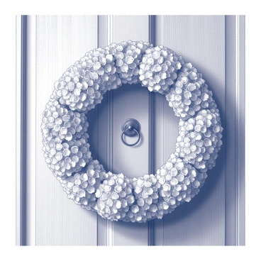 A circular wreath made entirely of dried hydrangea blossoms hanging on a rustic door