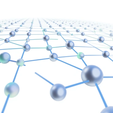 A detailed atomic-level grid composed of metallic atoms is displayed in the foreground. Each atom is represented as a small sphere with a shiny metallic finish. The atoms are interconnected by thin lines, representing bonds, which are glowing softly with bright blue light. The grid extends in all directions, creating a sense of depth and complexity. Some atoms are larger than others, adding variation to the pattern, and the glowing lines create a luminous network connecting the atoms throughout the image.