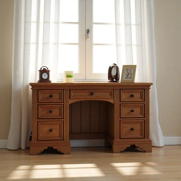 A bureau softly lit by daylight filtering through lace curtains