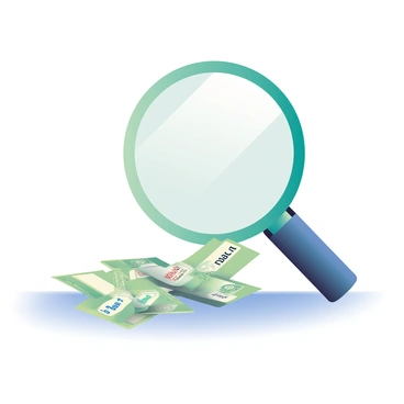 A large magnifying glass is positioned over a pile of various bills scattered on a flat surface. The glass is reflecting light, creating a slight distortion of the text beneath it. The bills are in different colors, showcasing small amounts of money and various logos. Underneath the magnifying glass, tiny debt terms such as "interest," "minimum payment," and "due date" are clearly visible. The background is softly blurred to keep the focus on the magnifying glass and the intricate details of the bills.