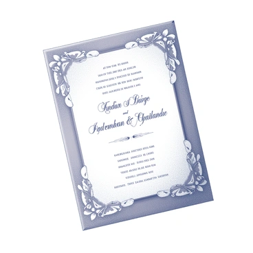 A wedding invitation card featuring elaborate and intricate designs. The card is adorned with delicate floral patterns and ornate borders. The central area of the card showcases elegant script, presenting essential details about the wedding. The typography is carefully styled, with some sections in larger, more decorative fonts. The overall layout is balanced, with the designs framing the text beautifully, creating a harmonious composition.