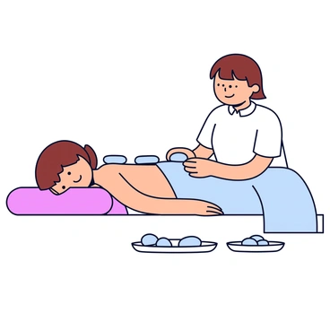 A therapist with short brown hair is gently placing smooth, round hot stones on the back of a person lying face down on a massage table. The person has a relaxed posture, with a light blue towel partially covering their body. The therapist's hands are steady and focused as they position the stones along the spine. The room is softly lit, creating a calm atmosphere. A few more stones are arranged neatly nearby on a small white dish.