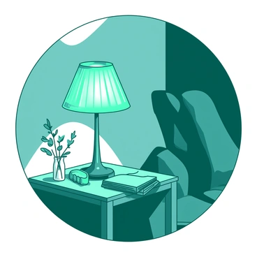 A teal electric lamp with a decorative shade is placed on a small wooden table in a dimly lit room. The lamp is turned on, casting a soft glow that illuminates the surrounding area. The walls are adorned with light-colored wallpaper, and there is a comfortable armchair in the corner, partially in shadow. A small stack of books sits on the table beside the lamp, their covers visible in the warm light. A delicate flower vase is positioned next to the lamp, adding a touch of charm to the scene.