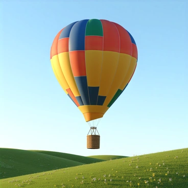 A colorful hot air balloon with a patchwork of vibrant colors, including red, blue, yellow, and green, is ascending into a clear blue sky. The balloon is tethered to a woven wicker basket, which is empty, suggesting it has just taken off. Below, the landscape features rolling green hills scattered with wildflowers, highlighting the beauty of nature. The sunlight illuminates the balloon, enhancing its brightness against the backdrop of the sky.