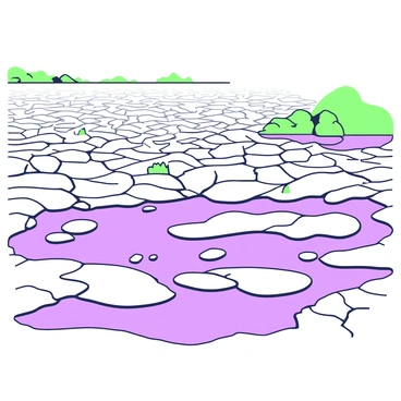A large reservoir, now mostly dried up, features expansive areas of cracked mud. The surface of the reservoir shows intricate patterns of fissures, creating a textured landscape. Scattered across this cracked terrain, there are several isolated puddles of water reflecting the open sky. In the background, a distant horizon is visible, with a few patches of green vegetation peeking through the dry ground, providing a contrast to the mud. The overall scene conveys the stark reality of the reservoir's diminished state.