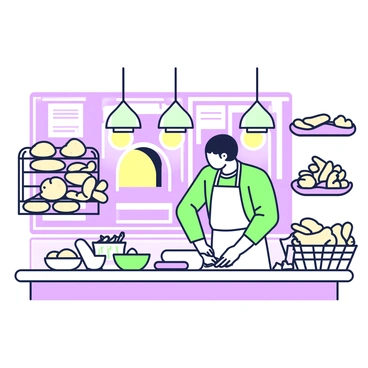 A warm, lit bakery with a boulanger preparing for the next day's bake