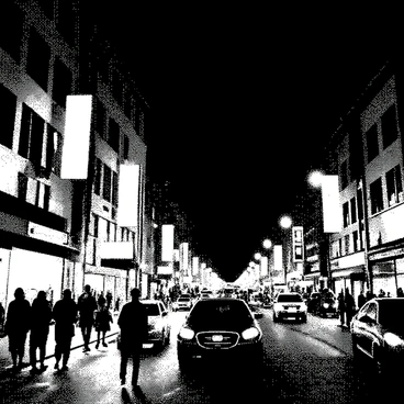 A busy street scene is depicted at night. The street is filled with various vehicles, including cars and bicycles. People are walking along the sidewalk, some stopping to chat or look at shops. Bright neon signs are hanging from buildings, displaying advertisements and illuminating the area. Streetlights cast a soft glow, illuminating the pavement and creating contrasts with the darkness of the night. The architecture of the buildings is varied, showcasing different styles and heights.