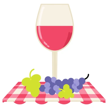 A clear wine glass filled with deep red wine stands upright on a red and white checkered picnic tablecloth. Green and purple grapes are scattered around the base of the wine glass, with some grapes lying on the tablecloth and others rolling slightly off the edge. The picnic tablecloth has crisp, defined squares, contrasting with the smooth curves of the wine glass.