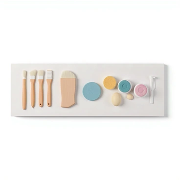 A countertop with a variety of esthetician tools arranged neatly. There are several brushes with wooden handles and soft bristles, each placed in a row. Next to the brushes, sponges of different shapes and sizes, including a round sponge and an egg-shaped sponge, are positioned. A few colorful face masks in jars are also present, showcasing different colors and textures. The countertop has a clean and organized appearance, enhancing the focus on the tools displayed.
