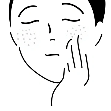 A close-up of a person’s face with soft features, focused on their cheeks and forehead. The person has a gentle expression, with their eyes closed and lips slightly parted. They are using their fingertips to apply a scrub on their skin, which has a slightly glistening texture. Small beads of the scrub can be seen on the skin's surface. The background is softly blurred to emphasize the action of exfoliating, and there are no distractions.