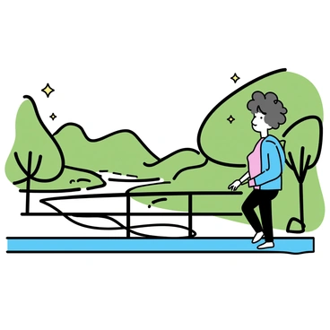 A person in a wheelchair is crossing a scenic bridge. The person, a woman with short curly hair, is wearing a light blue jacket and black jeans. She is looking out over the railing, taking in the view of a lush green valley below. The bridge is made of wood and stretches gracefully over a gentle stream, with trees lining the sides. Sunlight filters through the leaves, casting dappled shadows on the bridge's surface.