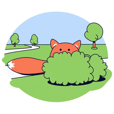 A small orange fox with a bushy tail is peeking out from behind a green shrub in a suburban park. The fox's ears are perked up, and its bright eyes are visible as it watches its surroundings. The bush is dense with leaves, providing cover for the fox. In the background, there are a few trees and a pathway winding through the park. A clear blue sky can be seen above, and the grass is lush and green.