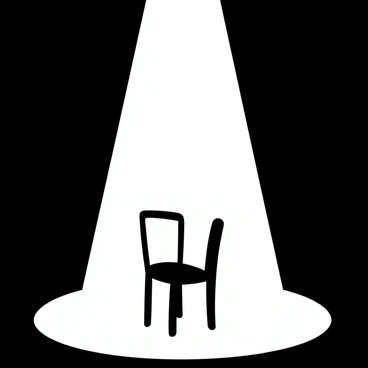 A simple wooden chair positioned directly beneath a single spotlight. The spotlight casts a stark pool of light around the chair, contrasting sharply with the surrounding dark room. The chair has a straight back and four legs, with no one sitting in it. The walls of the room fade into darkness, creating a sense of isolation, while the light emphasizes the chair's presence and solitude.