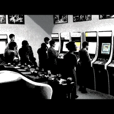 An arcade is bustling with activity, filled with retro-futuristic gaming consoles that have sleek designs and glowing screens. Players of various ages are standing in front of the consoles, their facial expressions showing excitement and concentration as they engage in games. Some players are gripping joystick controllers while others are focused on their screens. The atmosphere is vibrant with energy, as groups of friends cheer and exchange playful banter. The walls are adorned with vibrant and abstract posters showcasing classic gaming graphics, enhancing the lively ambiance of the scene.