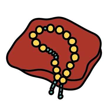 A string of rosary beads arranged on a velvet cloth with intricate details, showcasing the texture of the cloth and the design of the beads.