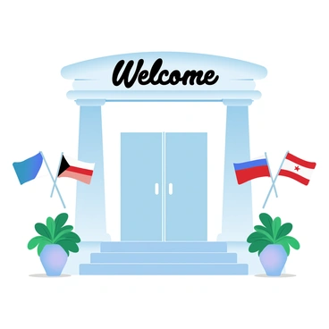 The entrance of an embassy features a set of grand double doors framed by tall pillars. Above the doors, a large "Welcome" sign is prominently displayed. Flanking the entrance are several colorful flags from different nations, waving gently in the breeze. Potted plants with lush greenery are positioned symmetrically on either side of the entrance. The ground is made of polished stone, reflecting the light and enhancing the formal atmosphere of the space.