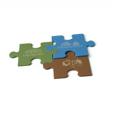 Three puzzle pieces, each resting on a flat surface, are labeled with the words "Legislative," "Executive," and "Judicial." The "Legislative" piece is in a green color with a rectangular shape, featuring a pattern that resembles a building representing Congress. The "Executive" piece is in blue with a rounded edge, illustrating a figure that symbolizes the presidency. The "Judicial" piece is in a brown hue, shaped like a square, decorated with symbols of a gavel and scales of justice. These pieces are interlocking at their edges, indicating how they fit together seamlessly.