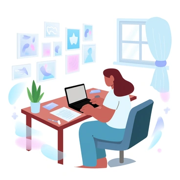 An illustrator working on a laptop from a cozy home office with creative art pieces on the walls