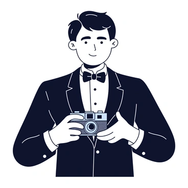 A black and white portrait of a man wearing a sleek tuxedo with a crisp white shirt and a shiny black bow tie. He has short, neatly styled hair and a focused expression on his face. The man is holding a vintage camera with a textured leather body and a large lens in front of him, slightly angled as if he is preparing to take a photograph. The background is softly blurred to emphasize the subject, creating a striking contrast with his formal attire.