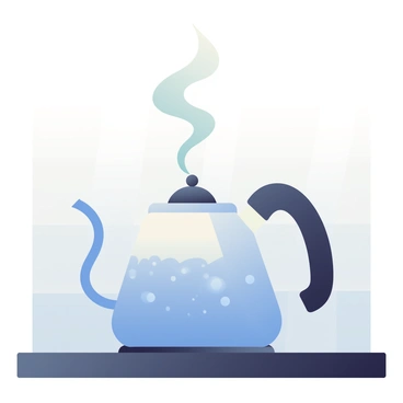 A polished silver kettle sits on a black stovetop. The kettle has a curved spout and a comfortable handle. Steam is visibly rising from the spout, creating soft tendrils of vapor that dissipate into the air. The water inside the kettle is bubbling vigorously, indicating that it is boiling. The background features a neutral-colored kitchen wall, enhancing the focus on the kettle and the steam.