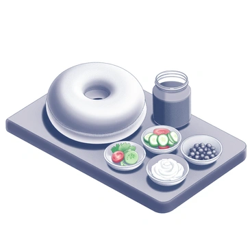 A plain bagel sits on a wooden board, its surface smooth and inviting. Beside it, there is an array of toppings and spreads. There are small bowls filled with cream cheese, fresh herbs, and colorful vegetables like sliced tomatoes and cucumbers. A jar of capers stands prominently among them. The scene is neatly arranged, showcasing the variety of textures and shapes, inviting customization of the bagel.