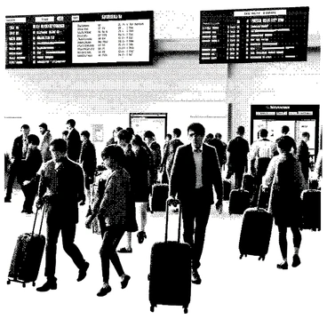 A busy airport terminal is filled with numerous travelers moving quickly in different directions. Some travelers are dragging their suitcases behind them while others are checking their boarding passes on their smartphones. A large departure board displays flight information prominently on the wall. In one corner, a family is huddled together, reviewing their travel plans. Nearby, a businessperson in a suit is on a laptop, appearing focused on work. Several signs provide directions to gates, restrooms, and lounges. The atmosphere is bustling with activity as people hurry to catch their flights.