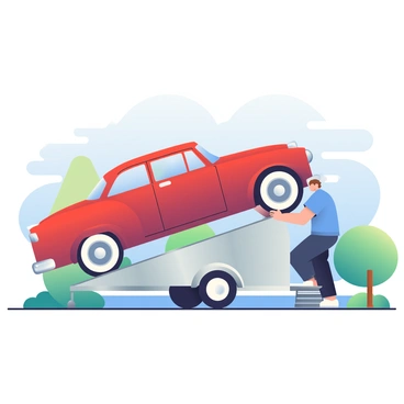 A classic vintage car, painted in a deep red color with chrome accents, is being carefully loaded onto a transport trailer. The car has a curved body shape and whitewall tires that highlight its retro design. A man with short brown hair is wearing a blue button-up shirt and is guiding the car up the ramp of the trailer. The transport trailer is a metallic silver and is parked on a smooth asphalt surface. Surrounding the scene are a few green trees and a clear blue sky, indicating a sunny day.