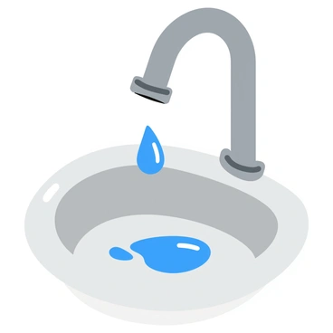 A shiny, transparent water droplet hanging from a silver faucet. The faucet has a slightly worn surface, showing signs of use. Below the droplet, there is a small puddle of water collecting on a chrome sink. The light reflects off the droplet, creating a highlight on its curved surface. The surrounding area is clean, with smooth edges and a subtle sheen on the sink.