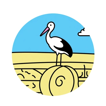 A white stork with black wing tips is perched on a round, golden hay bale. The stork has its long, red beak pointed forward, and its slender legs are resting on the bale. In the background, a vast rural landscape is visible with fields of ripe golden wheat ready for harvest. A clear blue sky stretches above, and a few fluffy white clouds drift by. The sunlight casts soft shadows on the hay, enhancing the texture of the scene.