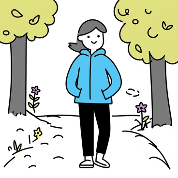 A person walking along a narrow forest trail, surrounded by tall trees with green leaves. The individual is wearing comfortable outdoor clothing, consisting of a blue jacket and dark pants. Sunlight filters through the foliage, casting dappled shadows on the ground. The forest floor is covered with a mixture of fallen leaves and small stones. In the background, there are wildflowers blooming in soft colors, adding touches of purple and yellow. The person has a relaxed posture, allowing them to engage with the serene environment.