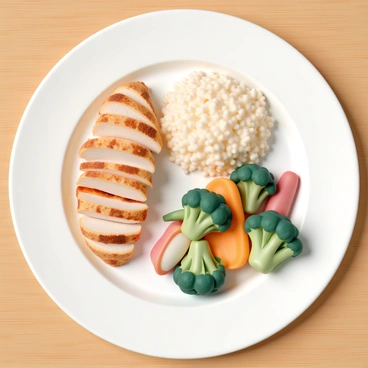 A round plate, divided into three sections. One section is filled with grilled chicken breast, cut into bite-sized pieces, representing protein. The second section contains a serving of brown rice, fluffy and steaming, symbolizing grains. The third section features a colorful assortment of steamed broccoli, carrots, and bell peppers, showcasing a variety of vegetables. Each section is neatly arranged, emphasizing the concept of a balanced diet. The plate is placed on a clean wooden table, adding a warm touch to the overall presentation.