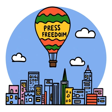 A colorful hot air balloon with a patterned design is floating high in the sky, above a bustling cityscape. The balloon prominently features the words "Press Freedom" in bold letters. Below, a skyline filled with various buildings, including tall skyscrapers and smaller structures, can be seen, reflecting a sense of urban life. The sky is bright blue with a few fluffy white clouds scattered throughout, enhancing the vibrant atmosphere of the scene.