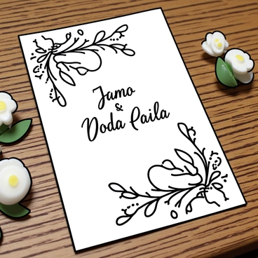 An elegant wedding invitation card featuring intricate floral designs is placed on a wooden table. The card is adorned with delicate calligraphy, showcasing the names of the couple in a flowing script. The surrounding wooden table has a rich, textured surface that complements the card's design. Subtle shadows cast by the card add depth to the scene, emphasizing its elegance and charm.