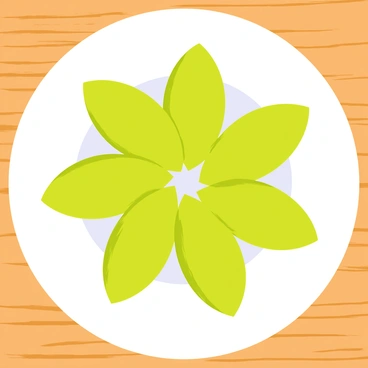 Thinly sliced amla pieces in a vibrant green color are arranged in a circular pattern on a smooth white plate. Each slice glistens with a subtle sheen, showcasing the texture of the fruit. The plate is placed on a simple wooden table, providing a natural contrast to the freshness of the amla. The arrangement creates a visually appealing design, highlighting the unique shape and color of the amla slices.