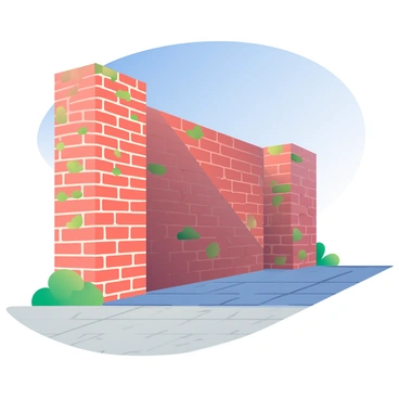 A tall, weathered brick wall stands prominently in the image, with its reddish-brown bricks creating a textured surface. The wall is sturdy and unpainted, showcasing patches of moss in the mortar joints. A long shadow extends from the wall, stretching across a sunlit path made of light gray cobblestones. The path is illuminated by bright sunlight, highlighting the uneven texture of the stones. In the background, a few green plants are visible, adding a touch of color to the scene. The sky above is clear blue, suggesting a bright day.