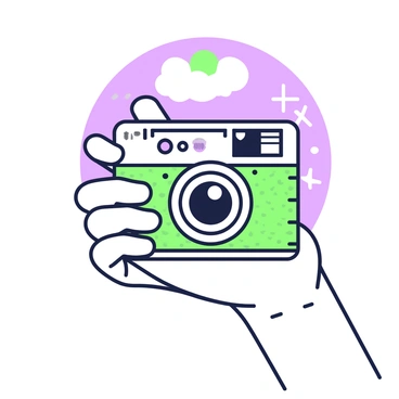 A right hand holding a vintage camera ready to take a photograph.
