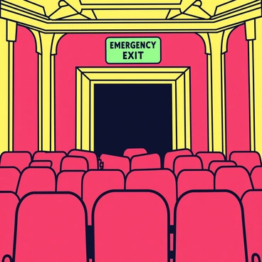 A large theater interior with rows of red velvet seats. A clearly marked emergency exit sign hangs above a wide door, illuminated in bright green letters. The door is positioned near the back of the theater, leading to a dark corridor. The walls of the theater are adorned with ornate gold trim, contrasting with the deep red of the seats. The ceiling features intricate designs, and soft lighting casts a warm glow throughout the space.