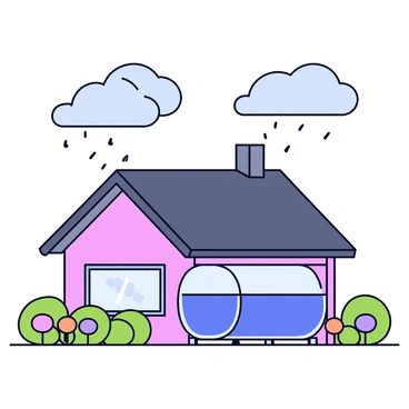 A house with a sloped roof designed to collect rainwater. The roof has a dark gray color and features a gutter system that channels the rainwater. A clear, cylindrical tank is positioned next to the house, receiving the water from the gutter. The tank is made of transparent plastic, allowing the water level to be seen. Surrounding the house are green shrubs and a small garden with colorful flowers. The sky above the house is filled with gray clouds, indicating that it is currently raining.