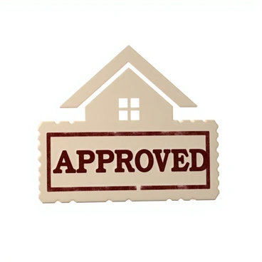 A rectangular stamp with a textured surface bears the bold letters "Approved" in a prominent font. The stamp features an inked impression in dark red. In the background, there is a silhouette of a house, outlined sharply against a light-colored backdrop. The house silhouette includes a triangular roof and a square window, adding depth to the overall design of the stamp.