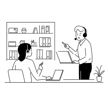 A help desk employee sitting at a curved wooden counter, attentively listening to a customer who is holding a laptop. The employee is wearing a headset and has a notepad in front of them. The customer, a middle-aged man with short hair, is expressing concern while pointing to the laptop screen. Shelves filled with various tech gadgets, accessories, and books are visible in the background. Soft ambient light from overhead fixtures creates a welcoming atmosphere within the store. A small potted plant is on the counter beside the employee.
