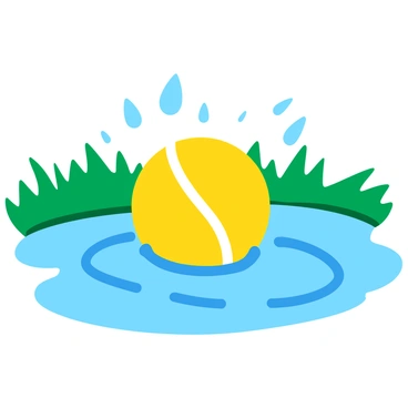 A bright yellow tennis ball making contact with the surface of a clear water puddle. The impact creates a dynamic splash, sending droplets of water flying in all directions. The surface of the puddle ripples outward from the point of contact. The background features a vibrant green grass surrounding the puddle, enhancing the scene's lively atmosphere.