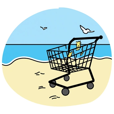 An empty shopping cart washed ashore on a sandy beach