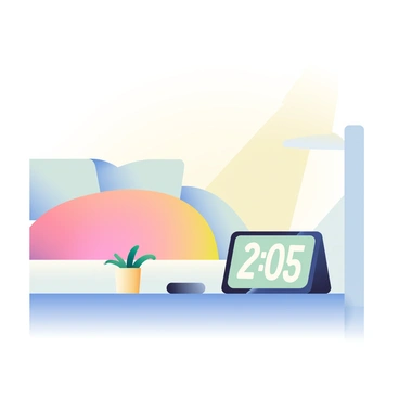 A modern alarm clock with a sleek design is positioned on a bedside table. The clock has a digital display showing the time in bright white numbers. The glowing light feature emits a soft, warm light that gradually brightens, illuminating the surrounding area. There is a cozy, fluffy bed in the background with a neatly arranged comforter and soft pillows. Next to the clock, there is a small potted plant adding a touch of greenery to the scene. The overall atmosphere suggests a peaceful morning routine, with the clock gently waking someone.