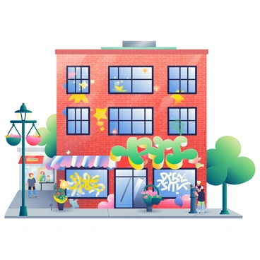 A brick building facade is covered in vibrant street art and graffiti. The artwork displays a variety of colors, including bright blues, yellows, and reds. Different styles of graffiti are present, featuring abstract shapes and intricate designs. The building is located in an urban setting, with a bustling street lined with small shops and pedestrians in the background. A light pole with hanging flower baskets stands to one side, and a few trees are scattered along the sidewalk. The sky is clear, allowing sunlight to illuminate the colorful artwork on the building.