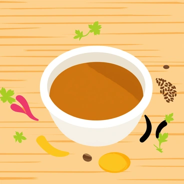 A traditional dish featuring a rich brown tamarind sauce is placed in a white ceramic bowl. The bowl is surrounded by various spices, including bright red chili powder, yellow turmeric, and dark cumin seeds, all arranged artfully on the wooden table. There are small sprigs of fresh cilantro scattered around the table, adding a touch of green. The warm wood grain of the table provides a rustic backdrop for the vibrant colors of the dish and spices.
