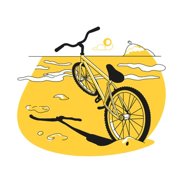 A bike tipping over on a sandy beachside trail, with waves crashing nearby