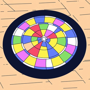 A handmade quilt featuring a vibrant dartboard pattern. The quilt is composed of various colored patches, including red, blue, yellow, and green, arranged in a circular design mimicking a dartboard. Each patch is neatly stitched together with contrasting white thread. The edges of the quilt are finished with a solid black border, providing a striking frame for the colorful design. The quilt is spread out on a wooden surface, showcasing its intricate stitching and bright colors.