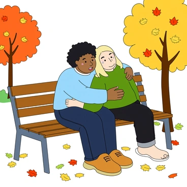 Two friends sitting close together on a wooden park bench surrounded by colorful autumn leaves. One friend has curly black hair, wearing a light blue sweater and dark jeans, embraces the other friend tightly. The second friend has straight blonde hair and is wearing a green jacket, with tears gently rolling down their cheeks. Both friends display expressions of support and understanding. The ground is covered with fallen yellow, orange, and red leaves, and a few trees in the background display vibrant autumn colors.